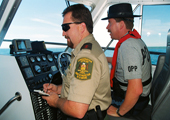 Ontario Ministry of Natural Resources Conservation Officer and Ontario Provincial Police on Patrol