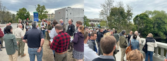 Two side-by-side photos showing groups of people gathered outdoors. On the left, a crowd stands near a mobile unit with signage, listening to a speaker. On the right, people are gathered along a bridge railing overlooking a river, engaged in discussion.